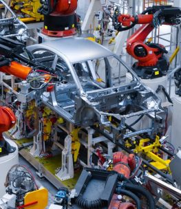 assembly-line-production-new-car-automated-welding-car-body-production-line-robotic-arm-car-production-line-is-working_645730-603